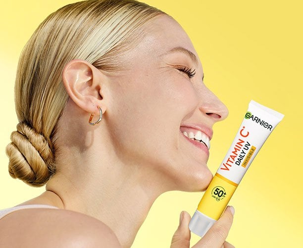לחות והגנה - תחליב לחות UV ויטמין C שקוף SPF50+‎